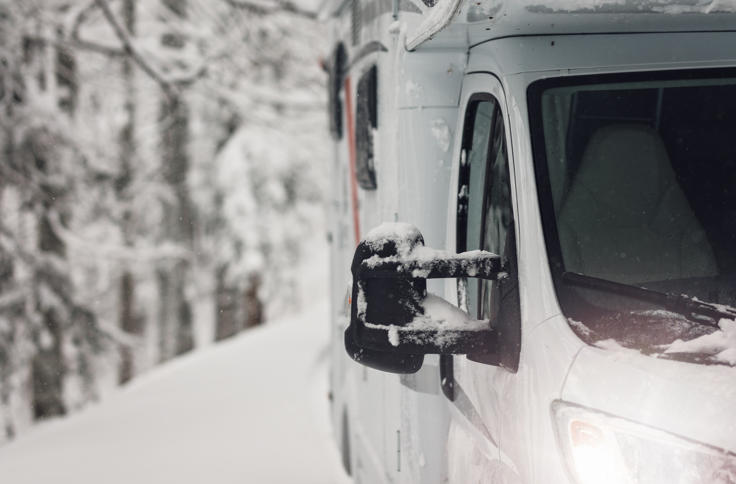 RV parked outdoors in the snow during winter